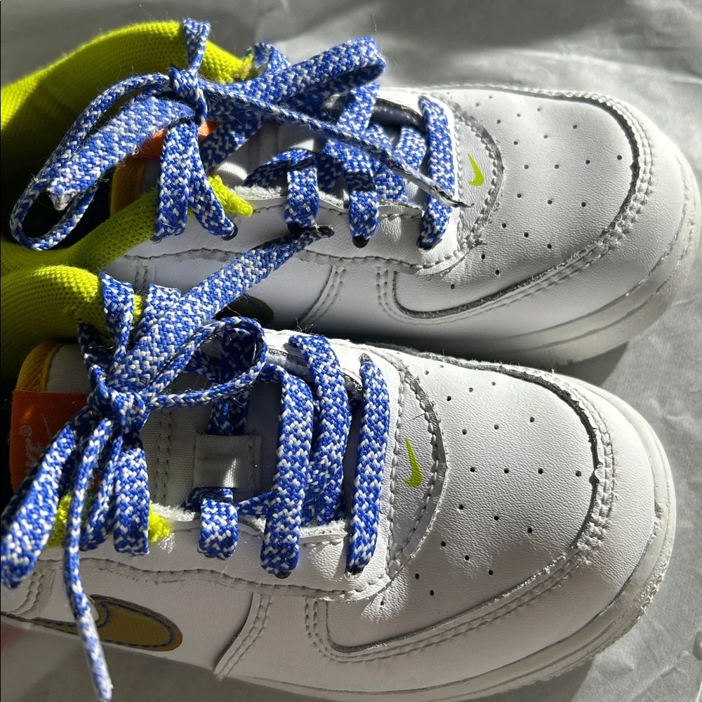 Nike White Sneakers with Blue and Yellow Highlights